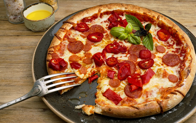 Perfect Pizza Partner: How to Use Olive Oil to Take Your Pizza to the Next Level