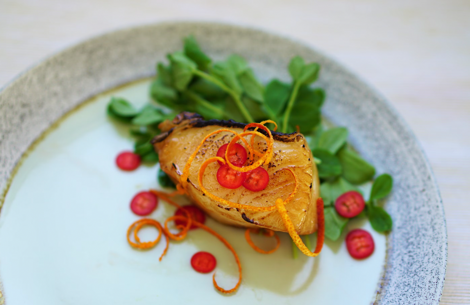 Savor the Symphony: Crafting Thyme and Lemon Infused Olive Oil Grilled Sea Bass